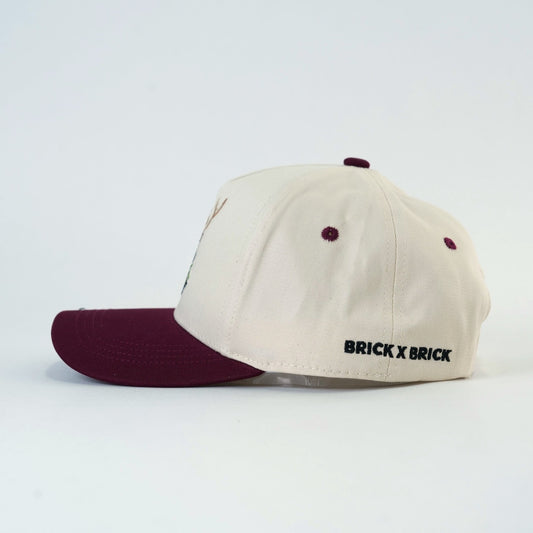 Cranberry Stag Cap side view with Brick X Brick embroidery