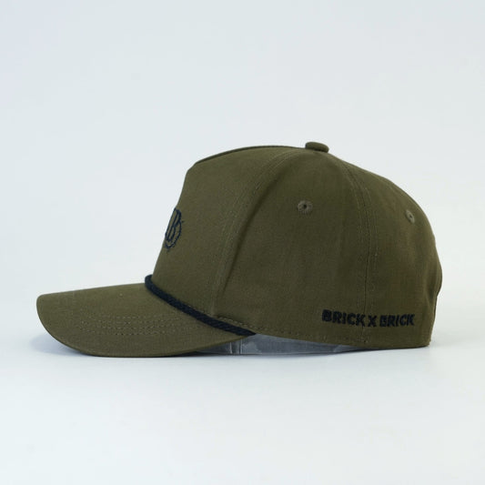 Woodsman Cap side view with Brick X Brick embroidery
