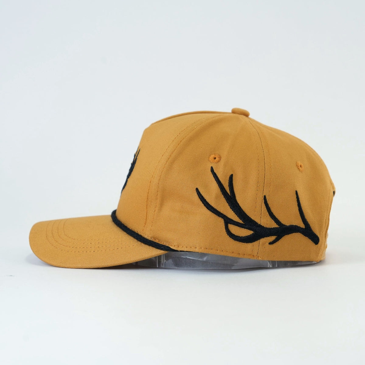 Timber Buck Hat side view with antler embroidery and rope detail
